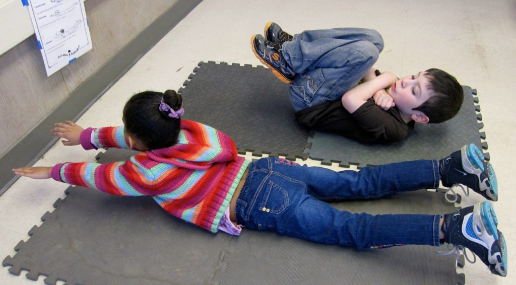 boy and a girl doing exercise